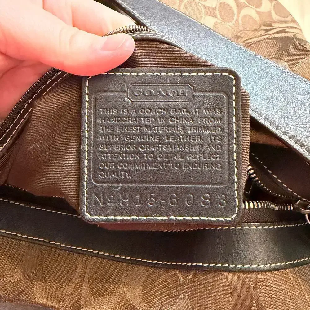 Coach Signature Canvas Hobo Bag in Brown/Tan